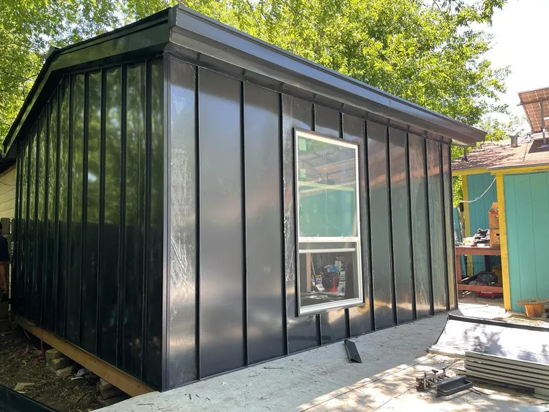 Black standing seam metal wall panels for Roof Inspection in Hattiesburg