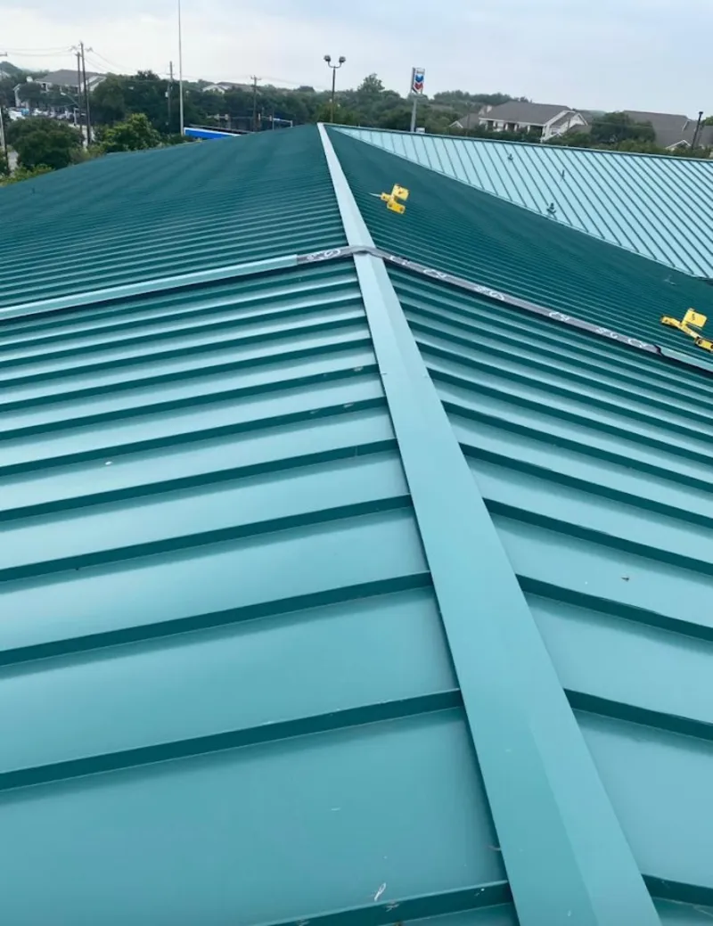 Green commercial metal roof ridge and valley for Metal Roof Repair in Hattiesburg